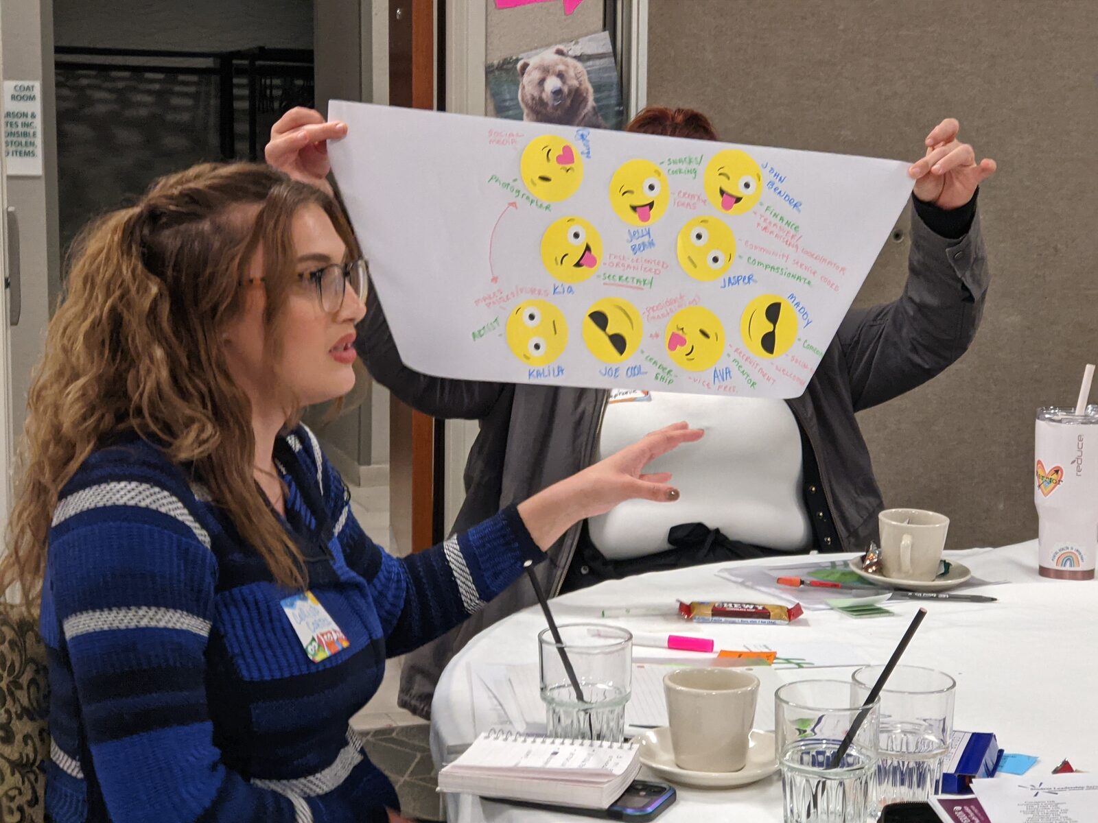 A peer educator presenting during an SLS workshop session