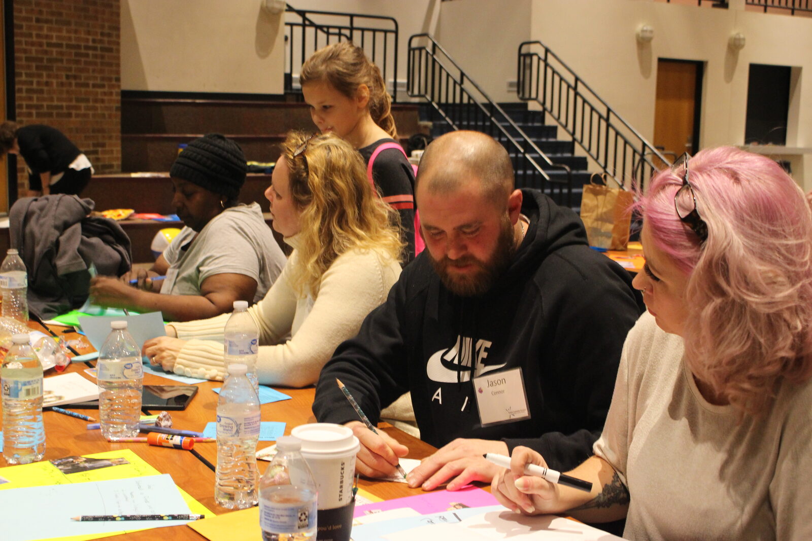 SLS staff leading a hands-on curriculum training session
